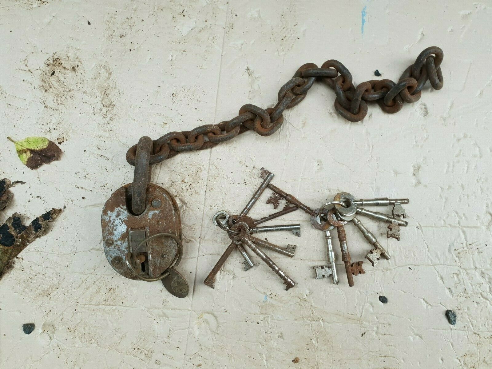 Rusty Old Insurance Padlock And Chain With Two Old Bunches Of Keys Prop ...